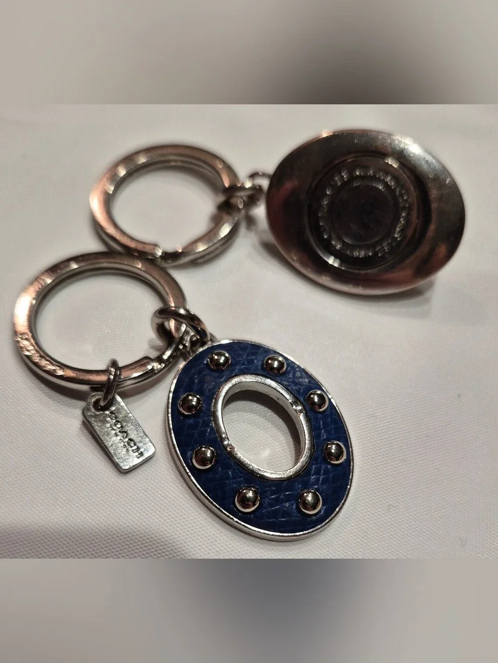 Coach Studded Leather Turnlock Keychain
